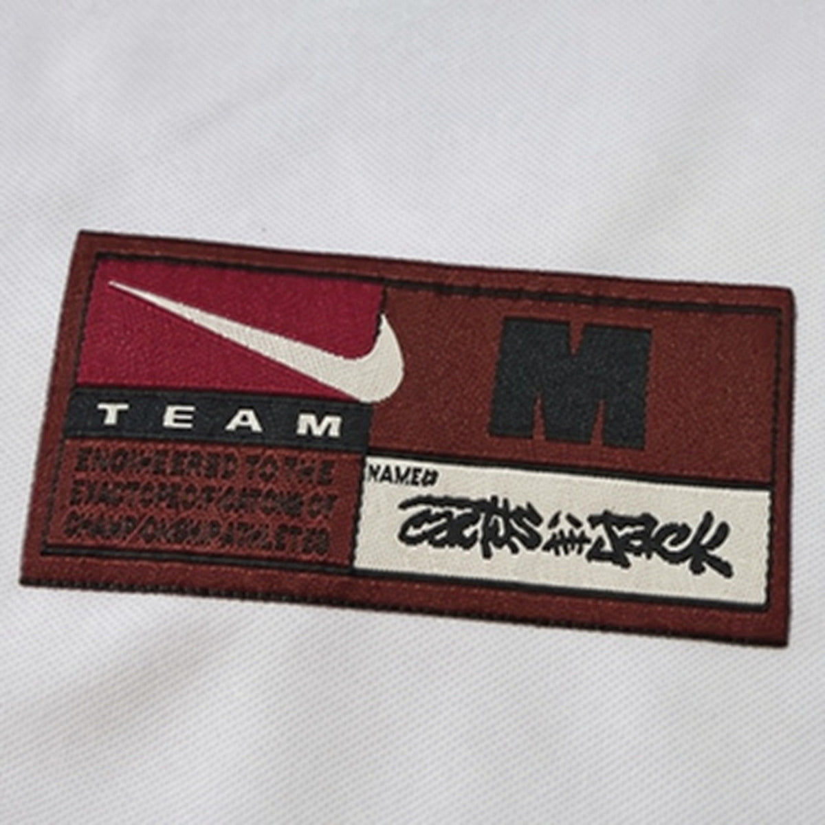 England Cactus Jack Total 90 retro jersey - hem label detail