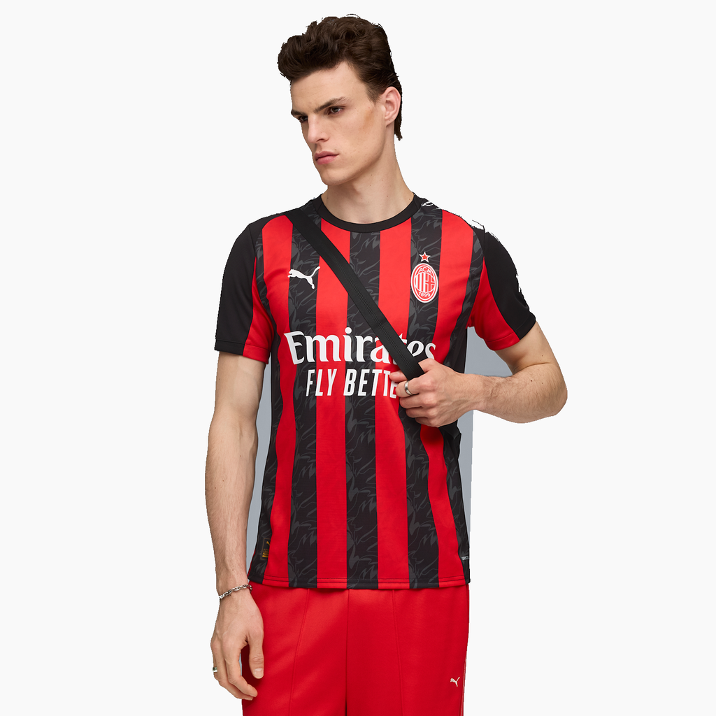 AC Milan 2025/26 Home soccer jersey - front view on model