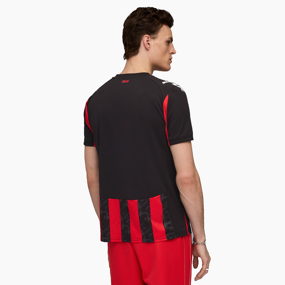 AC Milan 2025/26 Home soccer jersey - back view on model