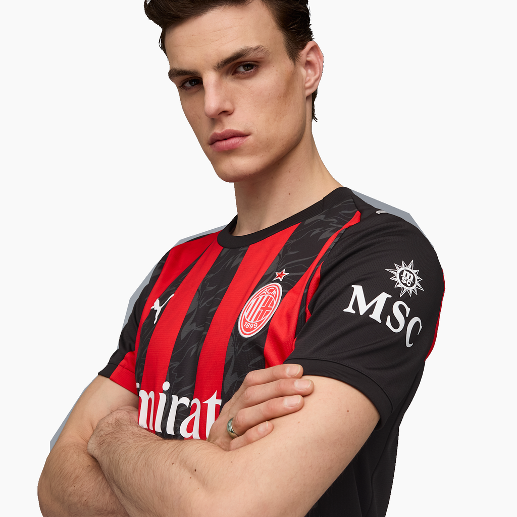AC Milan 2025/26 Home soccer jersey - sleeve and shoulder detail on model