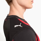 AC Milan 2025/26 Home soccer jersey - sleeve and shoulder detail on model