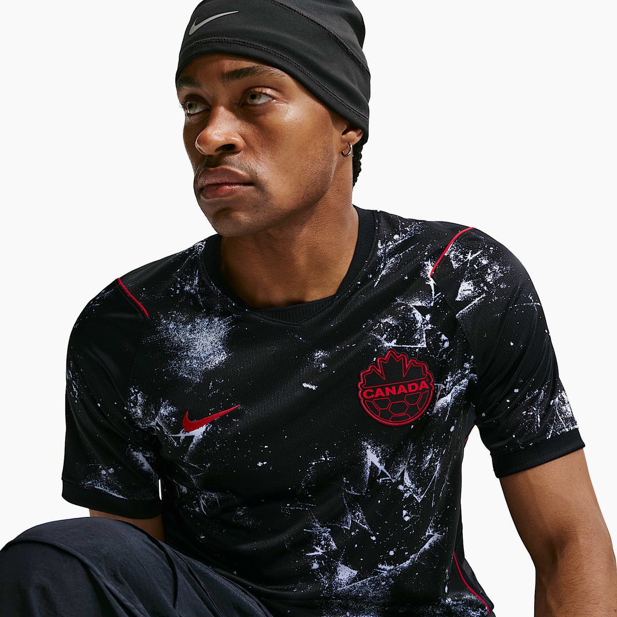 Canada 2026 Away soccer jersey - three-quarter seated view on model