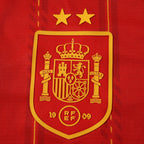 Spain 2026 World Cup Champions Kids Home Kit — crest detail