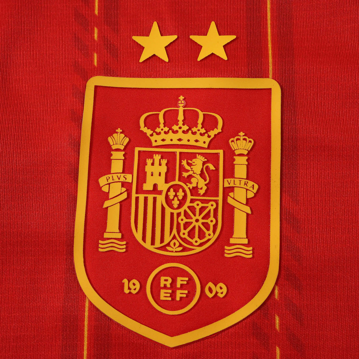 Spain 2026 World Cup Champions Kids Home Kit — crest detail