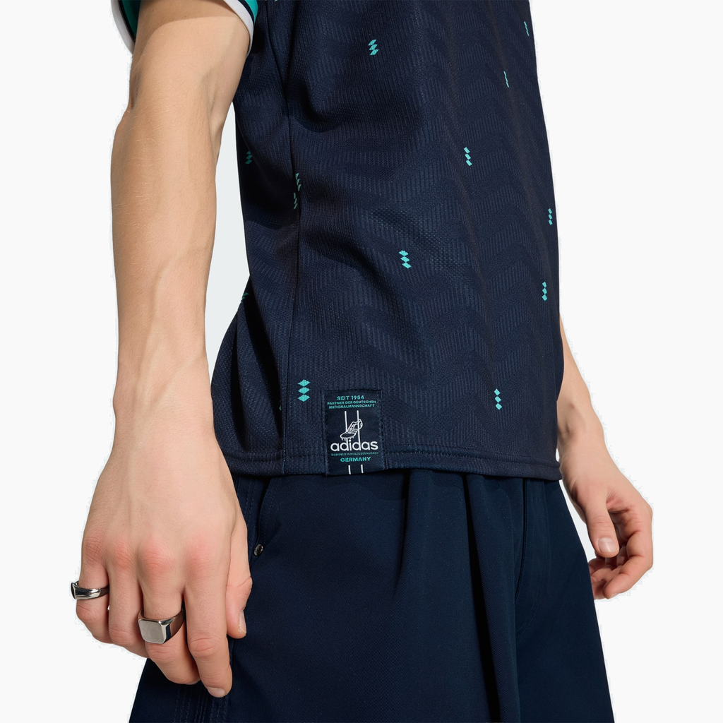Germany 2026 Away soccer jersey - hem label detail on model