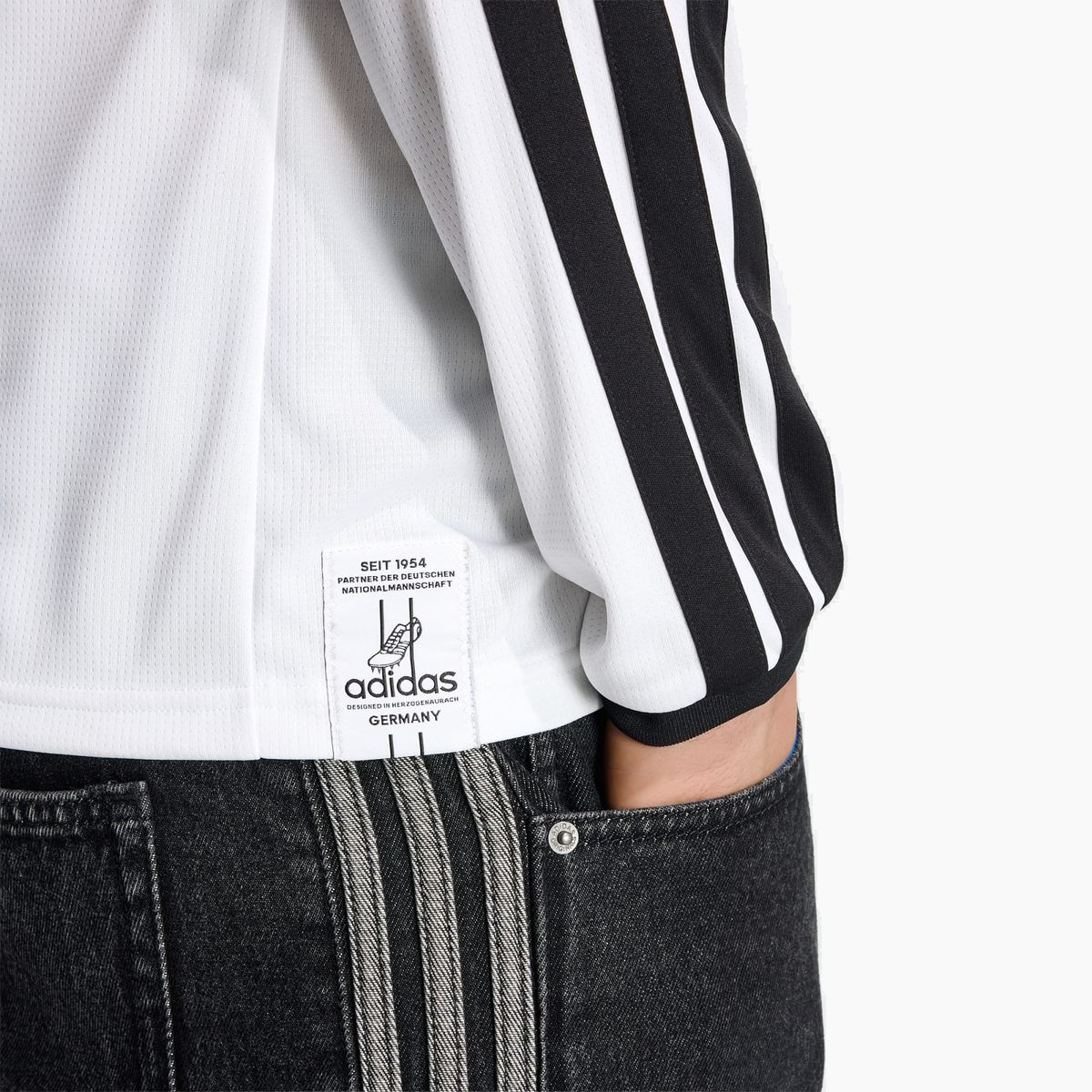 Germany 2026 Home soccer jersey - sleeve and shoulder detail on model