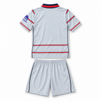 Atlético Madrid 2026/27 Third Kids Kit - shirt and shorts back; AI-assisted studio visualization based on the supplier-verified kit