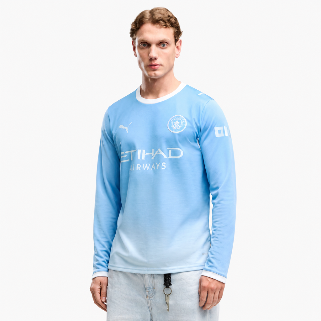 Manchester City 2026/27 Home Long Sleeve Jersey - front on model; AI-assisted background refinement