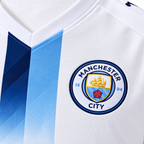 Manchester City 2026/27 Third Kids Kit — crest and fabric detail