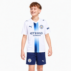 Manchester City 2026/27 Third Kids Kit — model wearing shirt and shorts