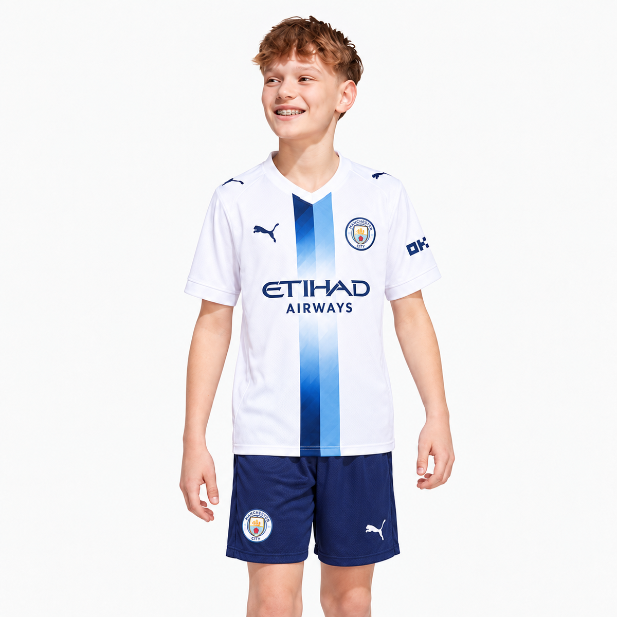 Manchester City 2026/27 Third Kids Kit — model wearing shirt and shorts