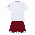West Ham United 2026/27 Away Kids Kit - shirt and shorts back; AI-assisted studio visualization based on the supplier-verified kit