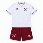 West Ham United 2026/27 Away Kids Kit - shirt and shorts front; AI-assisted studio visualization based on the supplier-verified kit