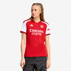 Arsenal 2026/27 Home Women's Jersey - woman wearing the shirt; AI-assisted studio background adaptation