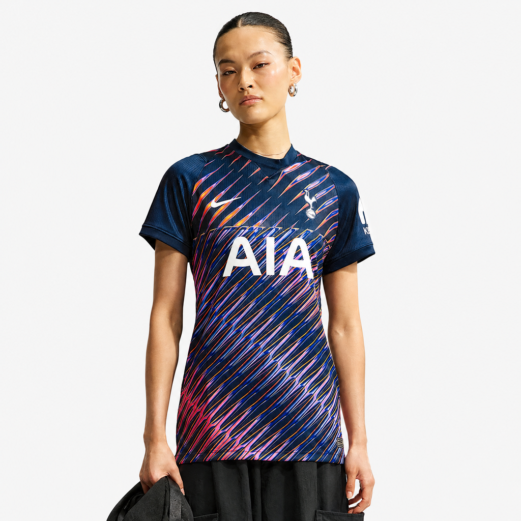 Tottenham Hotspur 2026/27 Away Women's Jersey - woman wearing the shirt; AI-assisted studio background adaptation