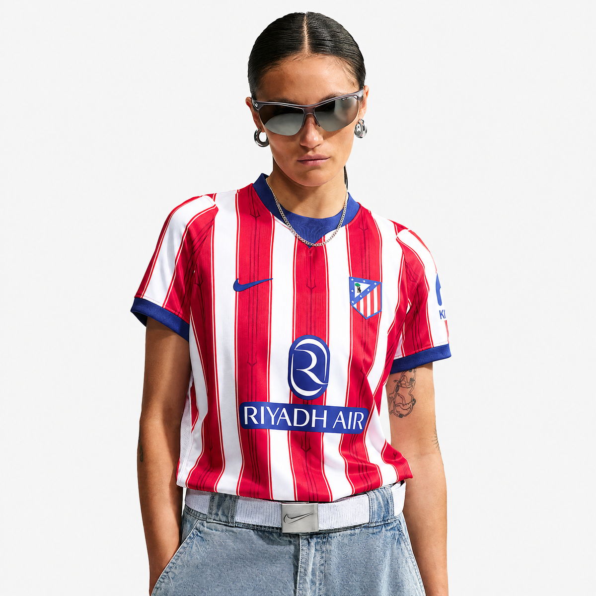 Atlético Madrid 2026/27 Home Women's Jersey - woman wearing the shirt; AI-assisted studio background adaptation