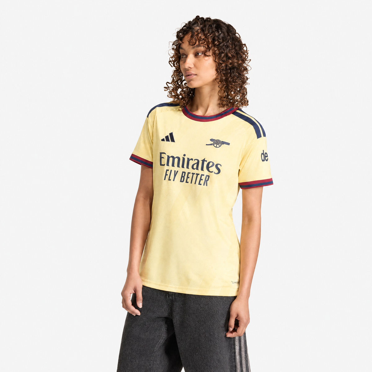 Arsenal 2026/27 Third Women's Jersey - woman wearing the shirt; AI-assisted studio background adaptation