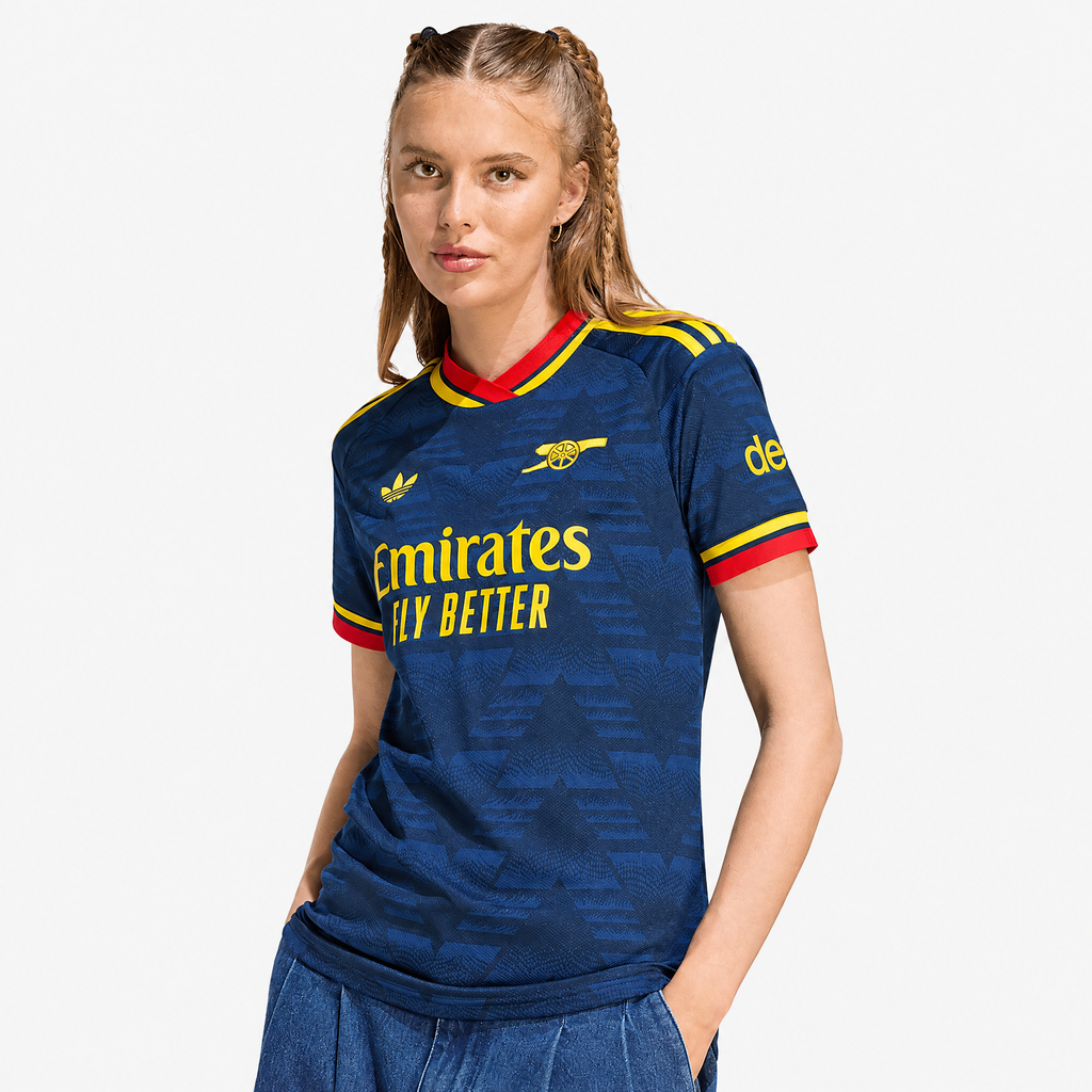 Arsenal 2026/27 Away Women's Jersey - woman wearing the shirt; AI-assisted studio background adaptation