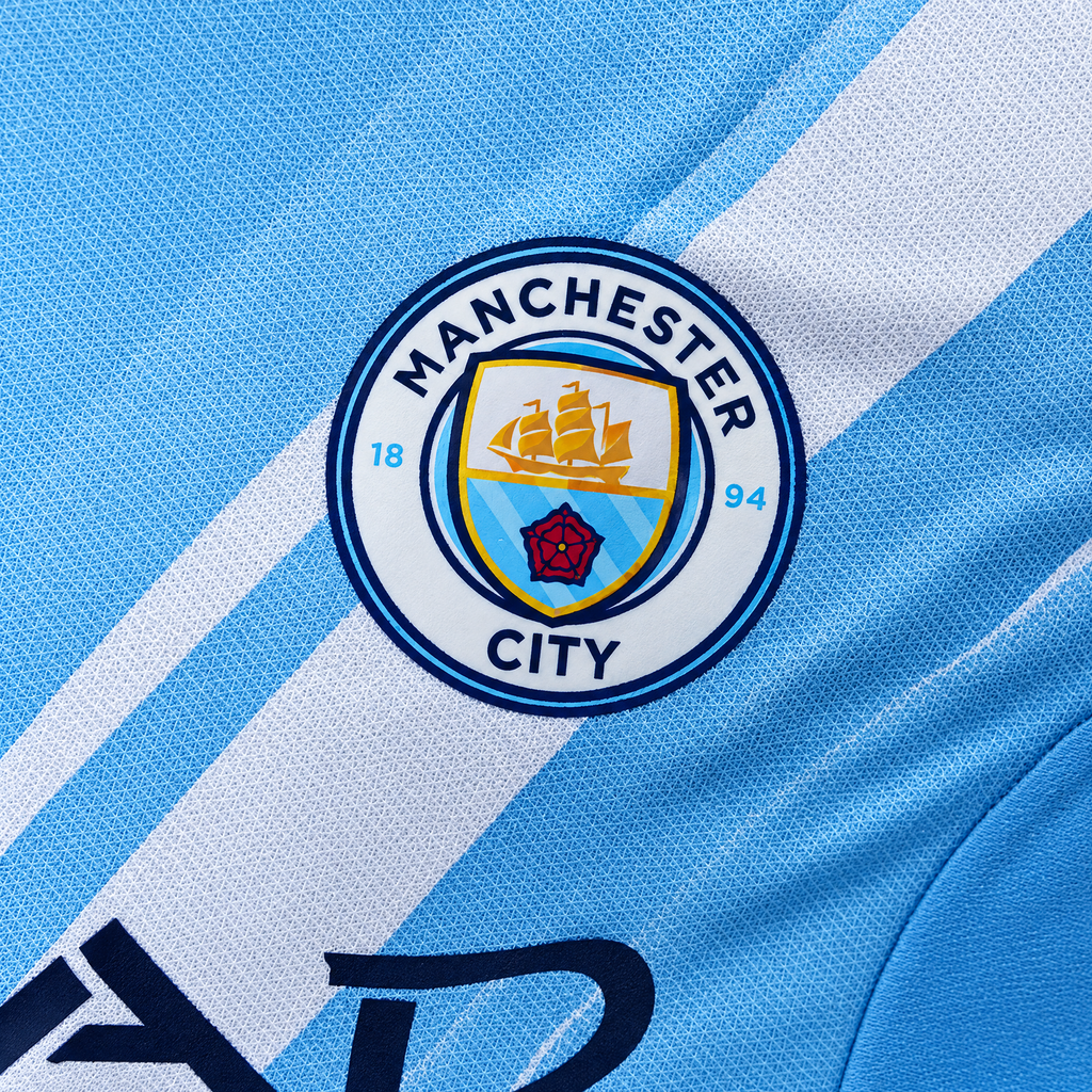 Manchester City 2025/26 Home Player Long Sleeve Jersey - fabric and crest detail