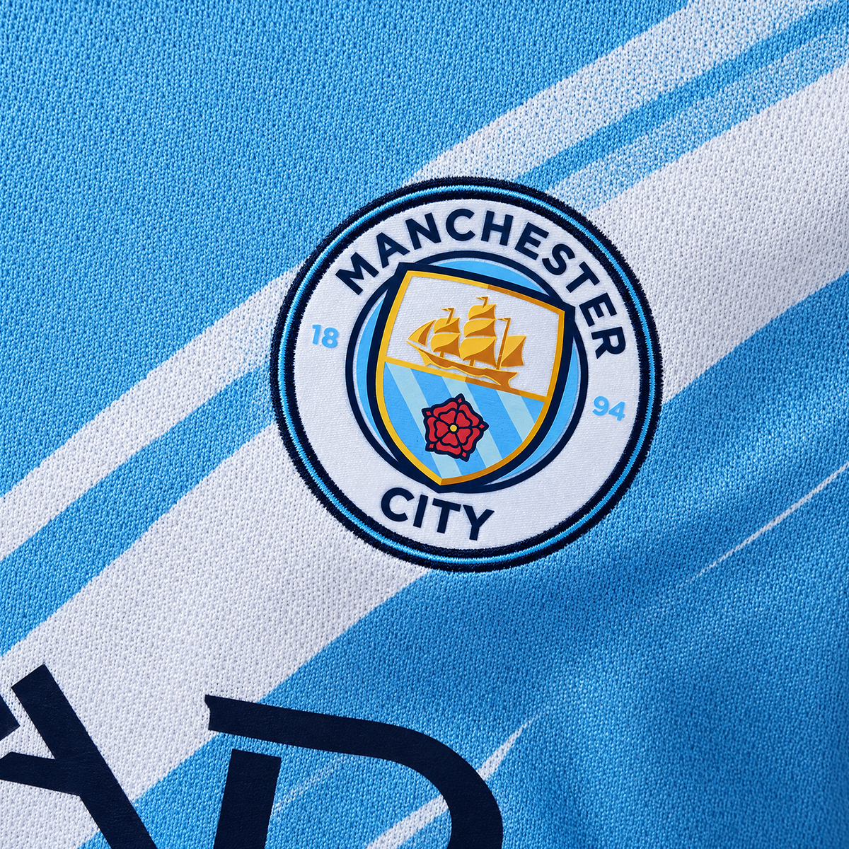 Manchester City 2025/26 Home Long Sleeve Jersey - fabric and crest detail