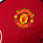 Manchester United 2025/26 Home Player Long Sleeve Jersey - fabric and crest detail