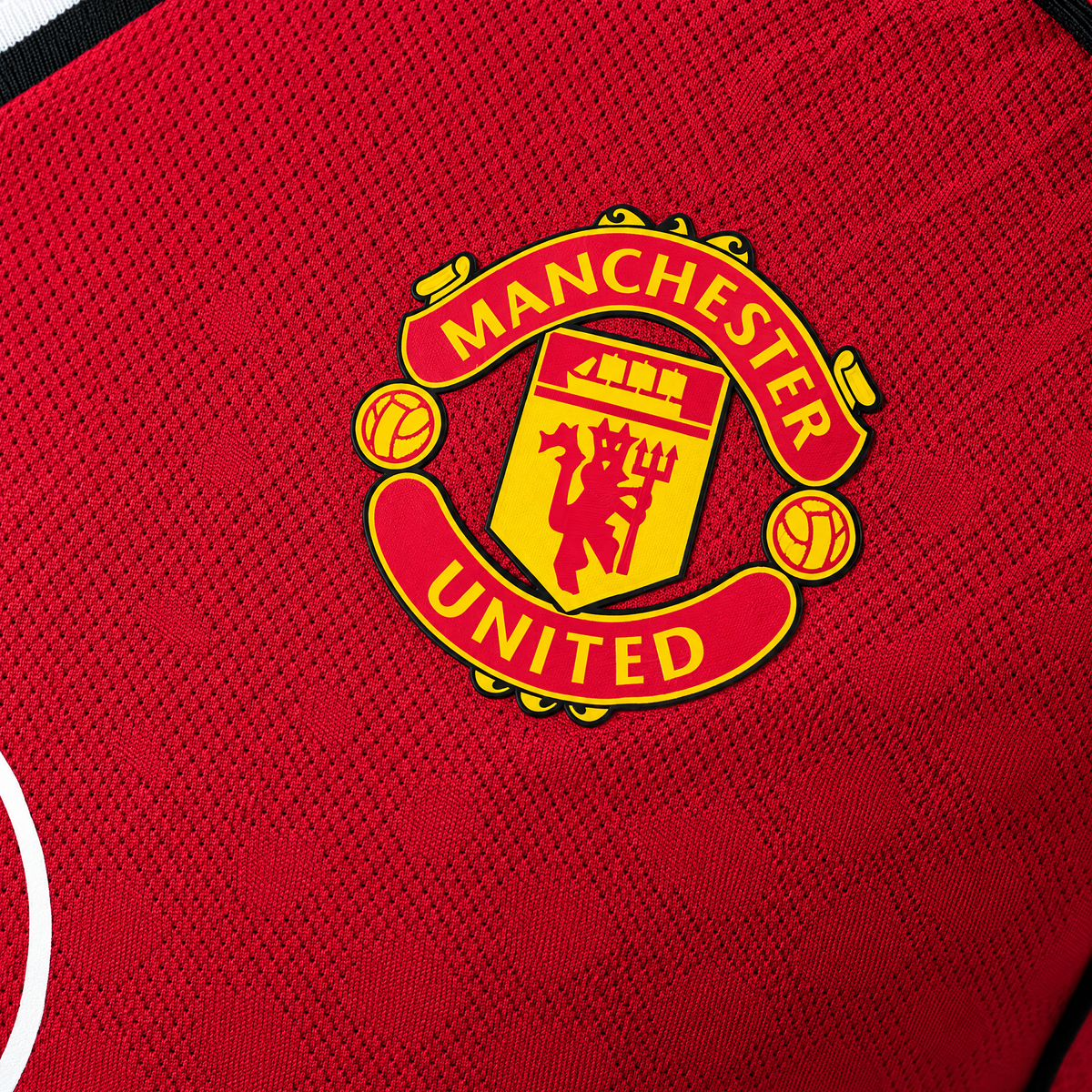Manchester United 2025/26 Home Player Long Sleeve Jersey - fabric and crest detail
