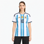 Argentina Messi #10 Women's Home Jersey 2026 World Cup — front on female model; AI-assisted product visualization
