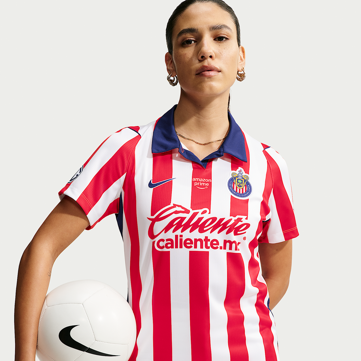 Chivas Guadalajara 2026/27 women home jersey - official model holding ball