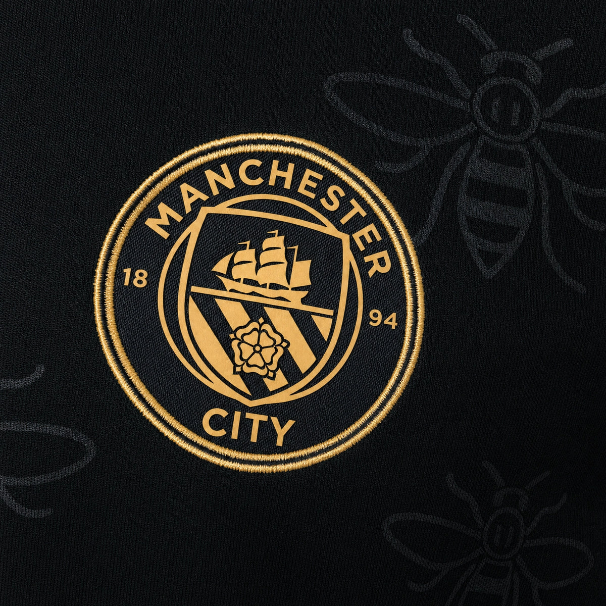 Manchester City 2026/27 Away Jersey — crest and fabric detail