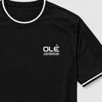 Olé Player Jersey — Black — logo detail