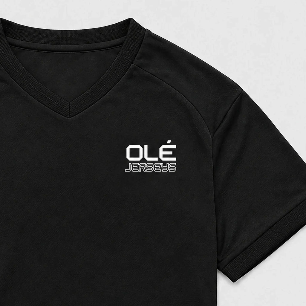Olé Women's Jersey — Black — logo detail