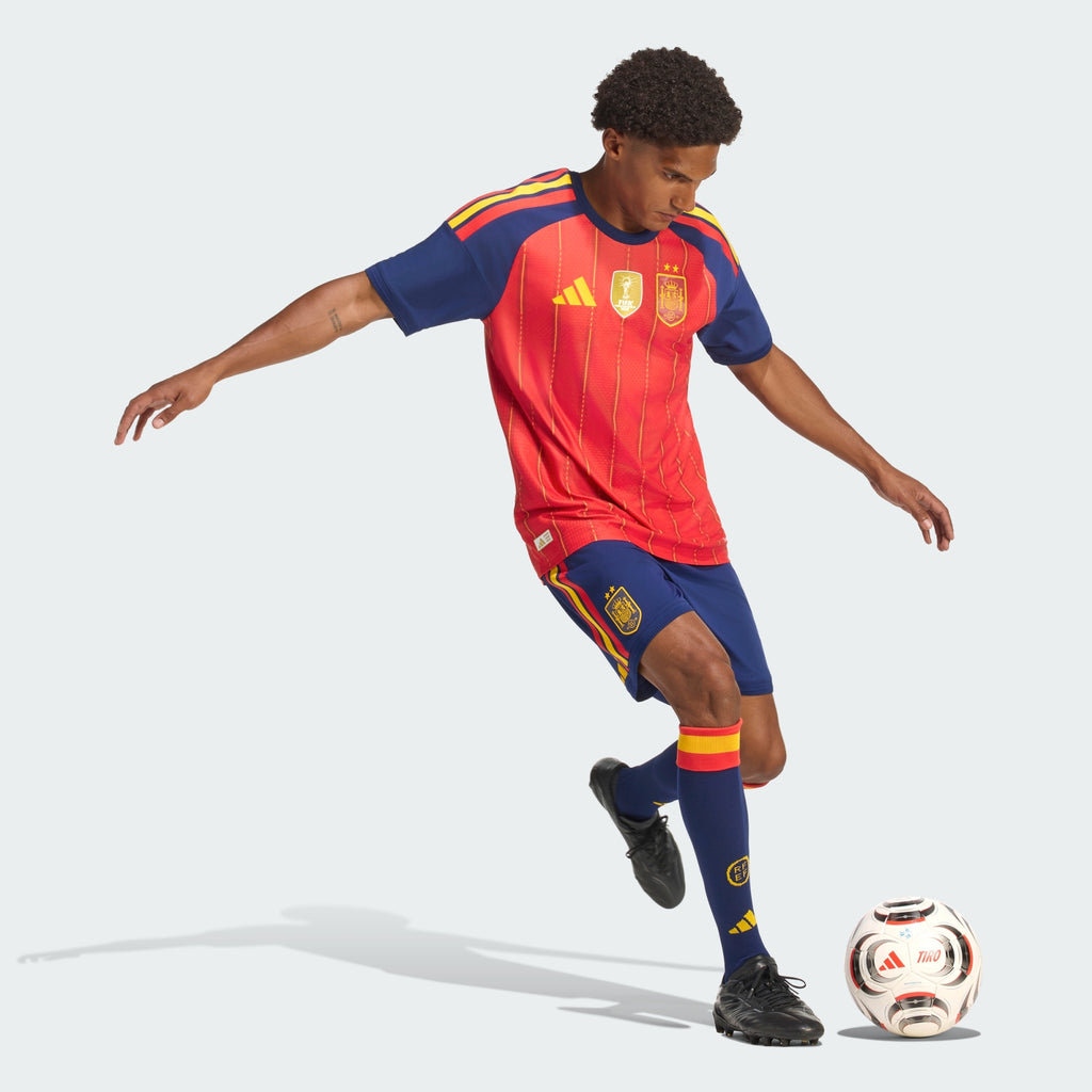 Spain 2026 World Cup winners home player jersey - movement view with ball