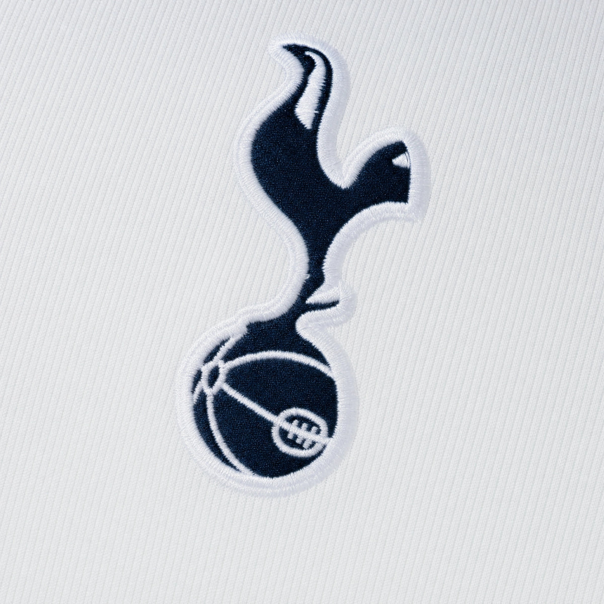 Tottenham Hotspur 2026/27 Home Jersey — crest and fabric detail